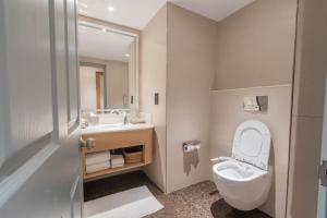 Koupelna v ubytování Hotel Royal Orchid Bangalore