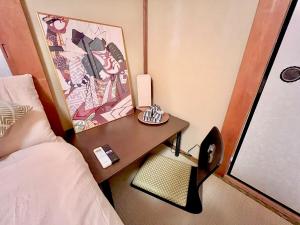 Postel nebo postele na pokoji v ubytování 千住4丁目1階 日本の和のお部屋スカイツリー9分秋葉原10分浅草12分