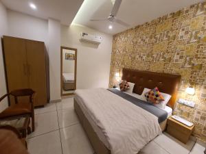 Mahadev Residency客房内的一张或多张床位