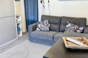 Posezení v ubytování Studio cosy avec balcon et vue sur la montagne à Chamrousse - 19 m²