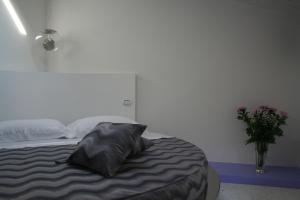 Postel nebo postele na pokoji v ubytování Ca' Ottocento