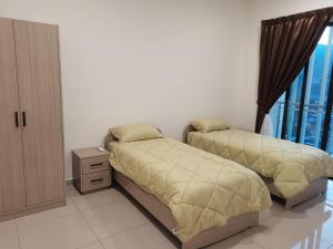 Postel nebo postele na pokoji v ubytování Sunshine Residence