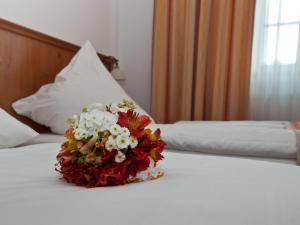Postel nebo postele na pokoji v ubytování Gasthof Klement