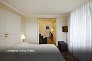 Krevet ili kreveti u jedinici u okviru objekta Hotel des Balances