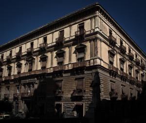a large building with balconies on the side of it at Liccu Bed and Breakfast in Catania