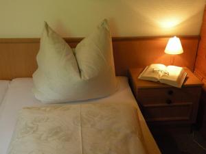 Letto o letti in una camera di Haus Simma