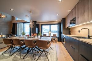 Η κουζίνα ή μικρή κουζίνα στο Lomavuokra Villa Cranberry A2, Levi central