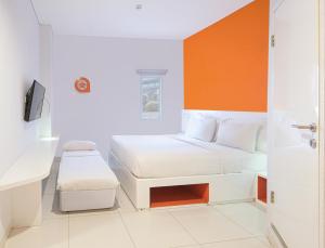 Voodi või voodid majutusasutuse Starlet Hotel Serpong toas