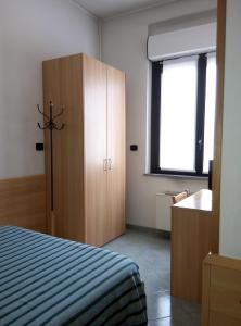 Posteľ alebo postele v izbe v ubytovaní Hotel Cristallo