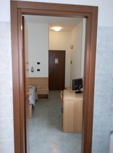 TV a/nebo společenská místnost v ubytování Hotel Cristallo