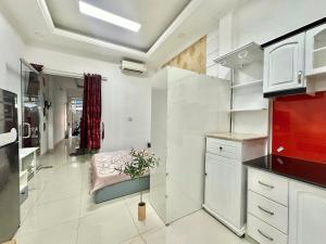 Kuchyň nebo kuchyňský kout v ubytování LoCo Premium Studios Self Check-in