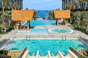 Der Swimmingpool an oder in der Nähe von Apec Beach Mui Ne Resort