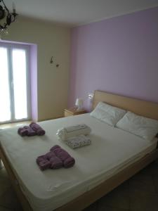 Voodi või voodid majutusasutuse Affittacamere Ristorante Amélie toas