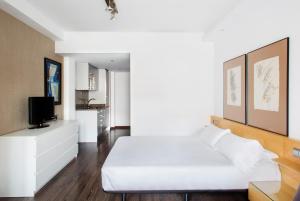 Ліжко або ліжка в номері Barcelona Apartment Aramunt