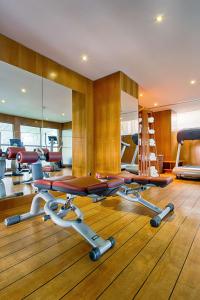 a gym with a bunch of exercise equipment in it at Hyatt Regency Nice Palais de la Méditerranée in Nice