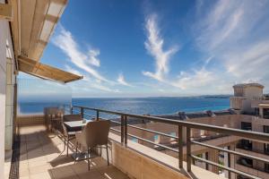 a balcony with a view of the ocean at Hyatt Regency Nice Palais de la Méditerranée in Nice