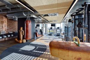 a gym with a sink in the middle of a room at Me and All Hotel Mainz, by Hyatt in Mainz