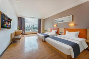 Voodi või voodid majutusasutuse Yunli Boutique Hotel toas