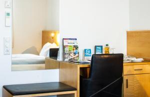 Postel nebo postele na pokoji v ubytování Hotel-Restaurant Steuermann