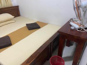 Postel nebo postele na pokoji v ubytování Lake Edge Hotel