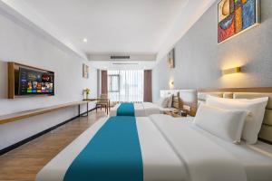 Voodi või voodid majutusasutuse Yunli Boutique Hotel toas