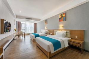 Voodi või voodid majutusasutuse Yunli Boutique Hotel toas