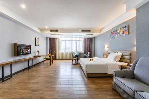TV a/nebo společenská místnost v ubytování Yunli Boutique Hotel