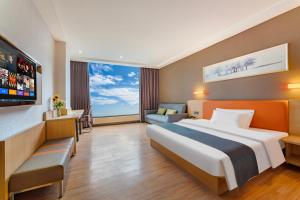 Voodi või voodid majutusasutuse Yunli Boutique Hotel toas
