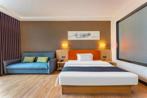 Voodi või voodid majutusasutuse Yunli Boutique Hotel toas
