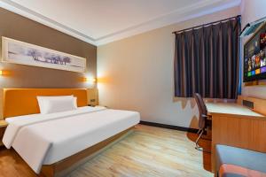 Televiisor ja/või meelelahutuskeskus majutusasutuses Yunli Boutique Hotel