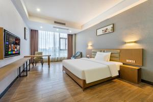Voodi või voodid majutusasutuse Yunli Boutique Hotel toas