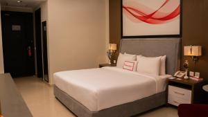 Ramada Resort by Wyndham Gilgit客房内的一张或多张床位
