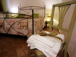 Voodi või voodid majutusasutuse B&B Le Logge Di Sopra toas