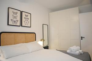 Posteľ alebo postele v izbe v ubytovaní Precioso apartamento en el centro de Málaga