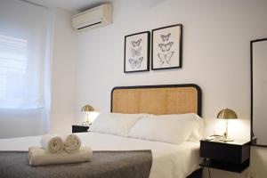 Posteľ alebo postele v izbe v ubytovaní Precioso apartamento en el centro de Málaga