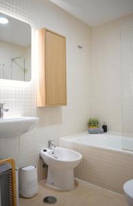 Kúpeľňa v ubytovaní Precioso apartamento en el centro de Málaga + 14 fotografií