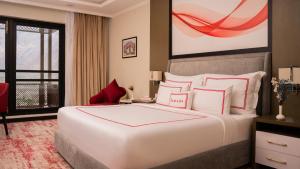 Ramada Resort by Wyndham Gilgit客房内的一张或多张床位