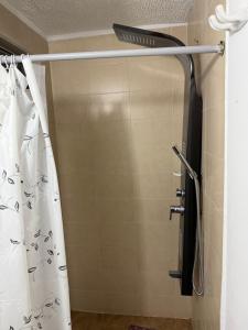 Ένα μπάνιο στο Apartamento cerca al aeropuerto