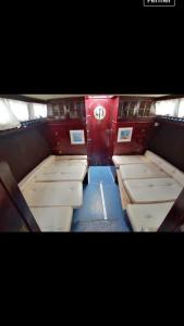 a small room with beds in the back of a train at vacances de rêve sur les vagues in Gruissan