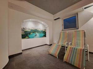 TV a/nebo společenská místnost v ubytování Hotel Tia Apart