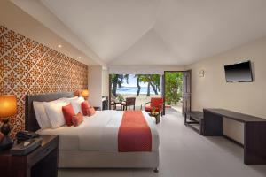 Voodi või voodid majutusasutuse Adaaran Select Huduran Fushi - Free Dine around Premium All Inclusive 24 hours - 1 Child Stays Free between April 2025 to September 2025 - 45 mins by Speedboat toas