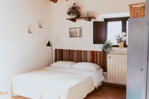 A bed or beds in a room at Bicoca - Casaletti Még 37 kép