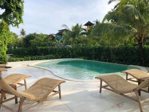 Bazén v ubytování Maha di Nusa Lembongan nebo v jeho okolí