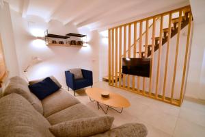 a living room with a couch and a table at CASABLANCA in Jávea