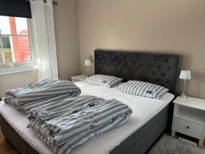 Postel nebo postele na pokoji v ubytování Konglefaret - apartment in Hønefoss