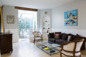 O zonă de relaxare la EXIGEHOME belle maison à colombages 5 minutes du RER