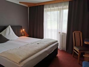 Postel nebo postele na pokoji v ubytování Pension Elisabeth