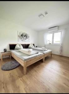 Postel nebo postele na pokoji v ubytování Resort Winklfeld 8b + 6 fotografií