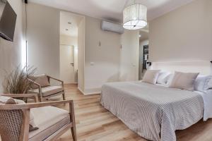 Voodi või voodid majutusasutuse Welchome - Suites toas