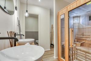 Vannituba majutusasutuses Welchome - Suites